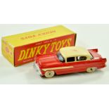 Dinky No. 174 Hudson Hornet Sedan. Issue is two-tone red and cream. Appears very good, note rub mark