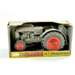 Ertl 1/16 farm issue comprising Case L Tractor on rubber tyres. Excellent and secured in box,