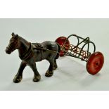 Kayron Olson large scale (nearly 10cm) Horse and Farm Rake. Some notable age wear but a hard issue