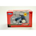 Britains 1/32 Farm issue comprising Ford TW35 Tractor. Excellent and secured in box. Note: We are