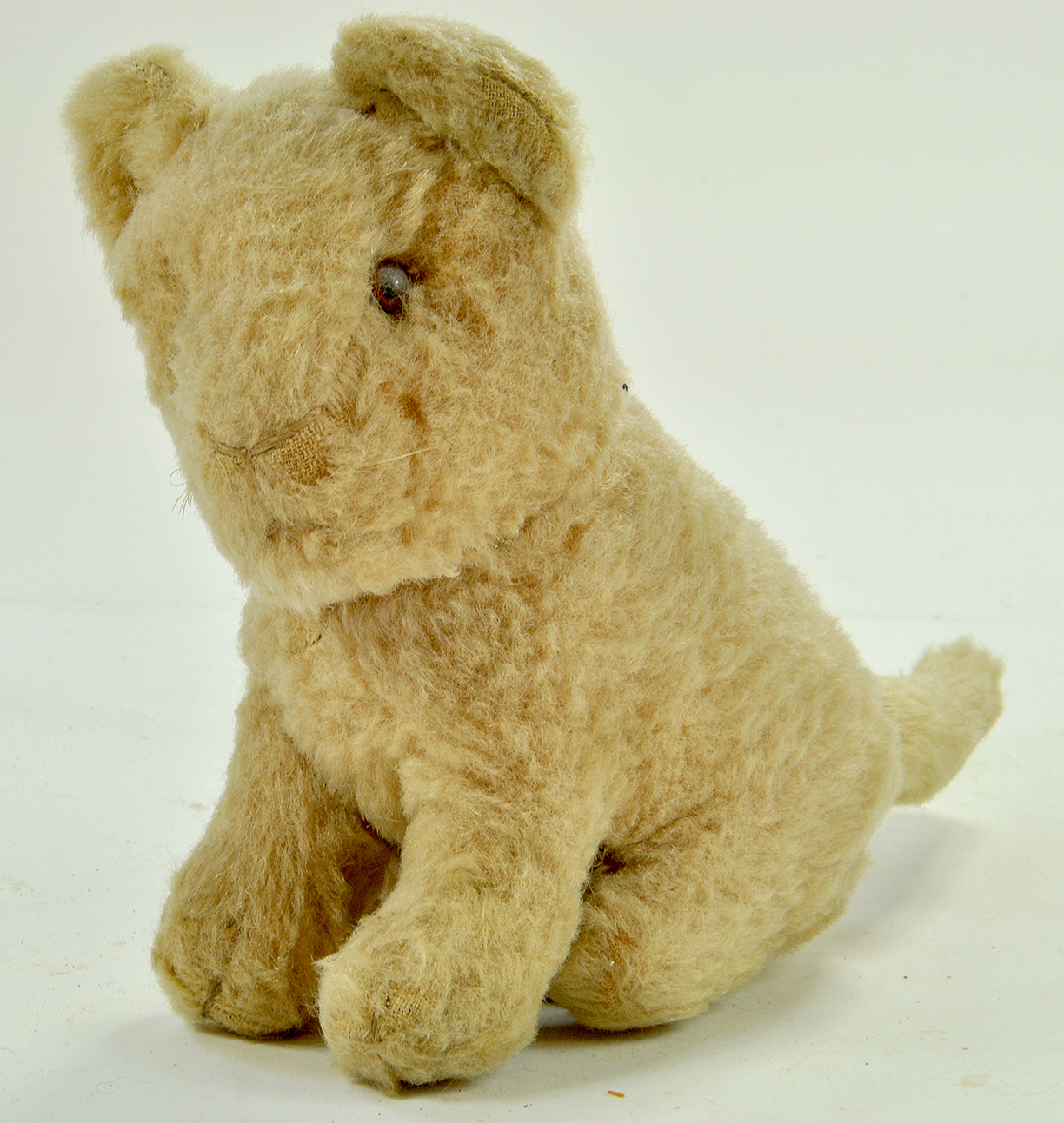 Unusual vintage Lion Cub with swivel head sits 20cm tall. Generally good. Note: We are always