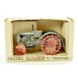 Ertl 1/16 farm issue comprising Case L Tractor. Excellent and secured in box, would benefit from a