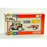 Britains 1/32 Farm issue comprising No. 9646 Massey Ferguson 362 Tractor with Mini Trailer and