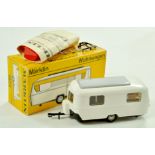 Marklin No. 1824 Caravan. Issue has white body, grey roof panel with instruction/accessory.