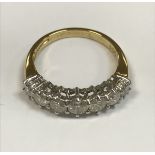 An 18ct gold seven stone diamond ring approx .