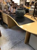 A Gordon Russell maple office desk of shaped form