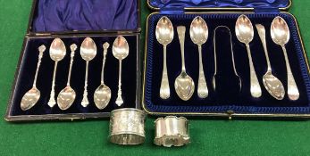 A set of six engraved silver teaspoons and tongs,