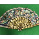 A 19th Century black lacquered and gilt decorated Chinese Qing Dynasty polychrome painted fan