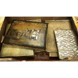 A box containing various blotters and folders including a mother of pearl gilt decorated and