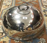 A large oval plated food dome with beaded decoration to the handle and rim