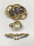 A Victorian pinchbeck and amethyst brooch,