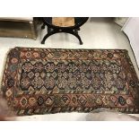 WITHDRAWN A Caucasian carpet,