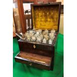 A 19th Century figured mahogany and ebony strung apothecary's chest,