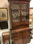 A Victorian mahogany and inlaid bureau bookcase cabinet,