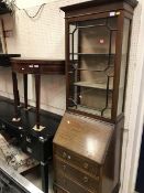 A 1920s mahogany ladies bureau bookcase together with an Edwardian mahogany demilune fold over tea