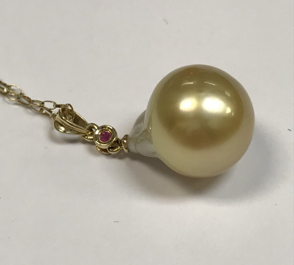 A single South Sea pearl necklace on chain