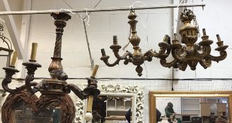 A pair of modern gilt-decorated twin wall sconces in the Regency style,