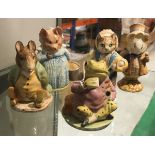 A collection of five Beswick Beatrix Potter figures including "Mr.