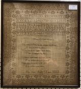 An early 19th Century needlework sampler with upper and lower case alphabet and numerals with poem