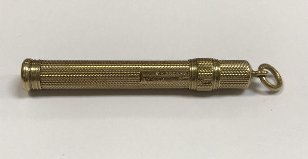 A Sampson Mordan & Co 9ct gold propelling pencil 9.