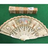 A 19th Century French fan with carved and painted ivory sticks,