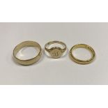 A 9ct gold wedding band 3.5g size V, a 22ct gold wedding band 4.
