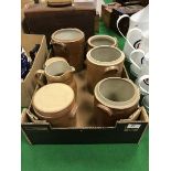 A modern French salt glazed pottery jug and six similar storage jars