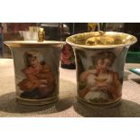 A pair of early 19th Century hand painted Sevres style cabinet cups decorated with "Two women"