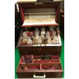 A Victorian mahogany cased apothecary's chest by Savory & Moore the rising lid with brass flush