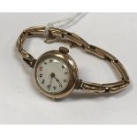 A circa 1900 9 carat gold cased ladies Rolex wristwatch with expanding bracelet,