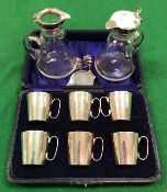 A set of six George V silver tots of mug form with gilt washed interiors (Birmingham 1920 by J.