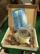 A box containing various 19th Century and other keys together with one volume Eric Monk "Keys Their