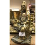 A Chinese bronze figure of Guan Yin seated with scroll in her hands,