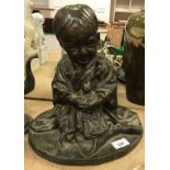 A Japanese Meiji period verdigris patinated bronze figure of a seated child with doll