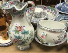 A Copeland (late Spode) floral decorated toilet set comprising jug, bowl, chamber pot, smaller bowl,