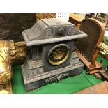 A Victorian black marble cased mantle clock of architctural form,