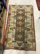 A Persian style rug,