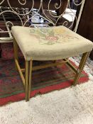 A circa 1900 painted and tapestry upholstered stool