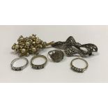 Four various ladies dress rings,