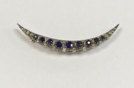 A circa 1900 diamond and sapphire crescent brooch of typical form, 5.