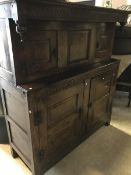 An oak court cupboard in the early 18th Century manner