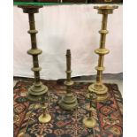 A large pair of 20th Century ecclesiastical style altar type candlesticks in the Gothic Revival