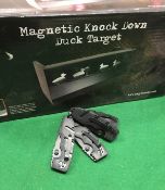 A magnetic Knockdown Duck Target game by Anglo Arms and a set of four folding knives