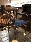 A set of five Regency mahogany bar back dining chairs with drop in seats on turned and octagonal