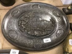 A 19th Century German cast iron plaque depicting various grand houses and coat of arms stamped