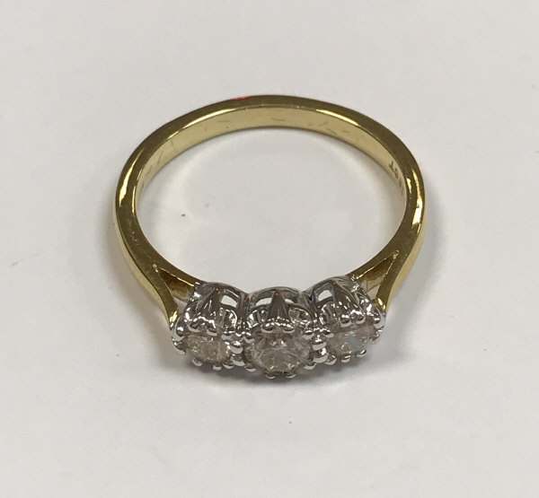 An 18ct gold three stone diamond ring approx. .