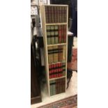 A modern gun cabinet cover as a book case