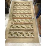 A needlework rug of striped pattern with stylised oak leaves and acorns, on a beige ground, approx.