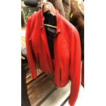 A Harley Davidson ladies red leather jacket,