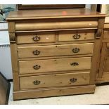 A Victorian pine North Country chest with cushion drawer over two short and three long drawers